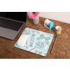 mockup of a mousepad lying on a rustic table next to a flower vase 27554 (1)