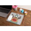 mockup of a mousepad lying on a rustic table next to a flower vase 27554 (2)