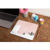 mockup of a mousepad lying on a rustic table next to a flower vase 27554 (3)