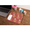 mockup of a mousepad lying on a rustic table next to a flower vase 27554 (4)