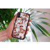 mockup of a woman holding a clear phone case in front of a houseplant 4636 el1 (9)