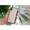 mockup of a woman holding a clear phone case in front of a houseplant 4636 el1