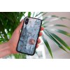 mockup of a woman holding a clear phone case in front of a houseplant 4636 el1 (9)