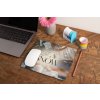 mockup of a mousepad lying on a rustic table next to a flower vase 27554 (5)