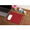 mockup of a mousepad lying on a rustic table next to a flower vase 27554 (1)