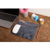 mockup of a mousepad lying on a rustic table next to a flower vase 27554 (4)