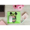 mousepad mockup over a wooden surface by some flowers and a laptop 27560