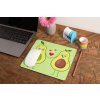 mockup of a mousepad lying on a rustic table next to a flower vase 27554