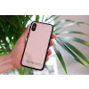 mockup of a woman holding a clear phone case in front of a houseplant 4636 el1