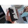 mockup of a man holding a clear phone case 4638 el1 (4)