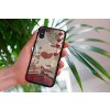 mockup of a woman holding a clear phone case in front of a houseplant 4636 el1 (3)