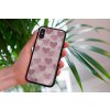 mockup of a woman holding a clear phone case in front of a houseplant 4636 el1 (3)