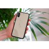 mockup of a woman holding a clear phone case in front of a houseplant 4636 el1