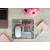 mousepad mockup over a wooden surface by some flowers and a laptop 27560
