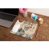 mockup of a mousepad lying on a rustic table next to a flower vase 27554 (3)