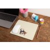 mockup of a mousepad lying on a rustic table next to a flower vase 27554