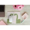 mousepad mockup over a wooden surface by some flowers and a laptop 27560 (1)