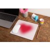 mockup of a mousepad lying on a rustic table next to a flower vase 27554