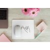 mousepad mockup over a wooden surface by some flowers and a laptop 27560