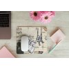 mousepad mockup over a wooden surface by some flowers and a laptop 27560