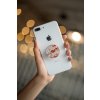 phone grip mockup with string lights in the background 22146