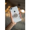 phone grip mockup with string lights in the background 22146