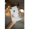 phone grip mockup with string lights in the background 22146