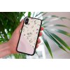 mockup of a woman holding a clear phone case in front of a houseplant 4636 el1 (84)