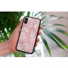 mockup of a woman holding a clear phone case in front of a houseplant 4636 el1 (85)