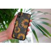 mockup of a woman holding a clear phone case in front of a houseplant 4636 el1 (97)