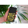 mockup of a woman holding a clear phone case in front of a houseplant 4636 el1 2023 03 30T120455.647