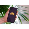mockup of a woman holding a clear phone case in front of a houseplant 4636 el1 2023 03 30T112831.589