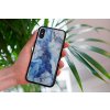 mockup of a woman holding a clear phone case in front of a houseplant 4636 el1 (4)