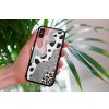 mockup of a woman holding a clear phone case in front of a houseplant 4636 el1 (36)