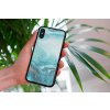 mockup of a woman holding a clear phone case in front of a houseplant 4636 el1 (17)