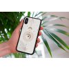 mockup of a woman holding a clear phone case in front of a houseplant 4636 el1 (87)