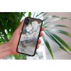 mockup of a woman holding a clear phone case in front of a houseplant 4636 el1 (23)