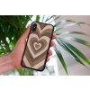 mockup of a woman holding a clear phone case in front of a houseplant 4636 el1 (10)