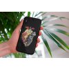 mockup of a woman holding a clear phone case in front of a houseplant 4636 el1 (35)