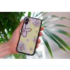 mockup of a woman holding a clear phone case in front of a houseplant 4636 el1 2022 04 20T125343.618