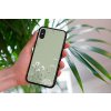 mockup of a woman holding a clear phone case in front of a houseplant 4636 el1 2022 04 19T145433.500