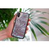 mockup of a woman holding a clear phone case in front of a houseplant 4636 el1 2022 04 26T124127.658