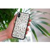 mockup of a woman holding a clear phone case in front of a houseplant 4636 el1 (26)
