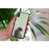 mockup of a woman holding a clear phone case in front of a houseplant 4636 el1 (18)