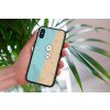 mockup of a woman holding a clear phone case in front of a houseplant 4636 el1 (7)