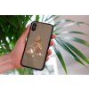 mockup of a woman holding a clear phone case in front of a houseplant 4636 el1 (5)