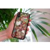 mockup of a woman holding a clear phone case in front of a houseplant 4636 el1 (94)