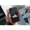 mockup of a man holding a clear phone case 4638 el1 2023 03 30T105323.046