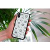 mockup of a woman holding a clear phone case in front of a houseplant 4636 el1 (94)