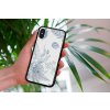 mockup of a woman holding a clear phone case in front of a houseplant 4636 el1 (27)